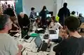 Carré central mapathon et coin OSM au fond