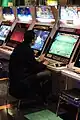 A gamer at the arcade.