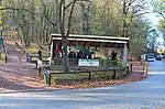 amenity=animal_hitch + donkey=designated + animal_hitch=rail + shelter=yes