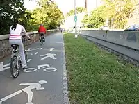 Pedestrians and cyclists share the same lane. The way is not segregated.