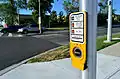 Canada: Tactile arrow on a call button