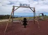 Photopoint featuring a large labeled swing tourism=photopoint photopoint:prop=swing;sign