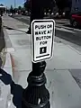 United States: A call button that can be pressed or waved at to activate