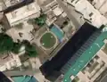 5/5 Covered reservoir (man_made=reservoir_covered) round-shaped in the middle of a dense urban area in Pyongyang (Maxar satellite imagery).