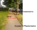 Unterschiedliche Oberfläche auf einem Gehwegabschnitt