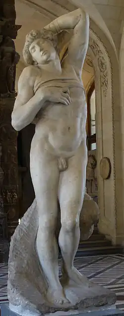 Marble sculpture of a nude male figure with a muscular build, leaning to one side with eyes closed