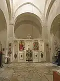 Interior of the church with the white iconostasis