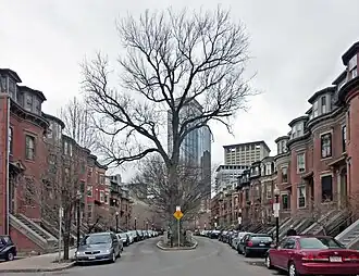 Crowded, narrow residential street