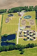 Image 11A wastewater treatment plant in Cuxhaven, Germany. Wastewater treatment is a process used to remove contaminants from wastewater or sewage and convert it into an effluent that can be returned to the water cycle with acceptable impact on the environment, or reused for various purposes (called water reclamation)