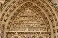 West façade: upper (main) tympanum of the portal