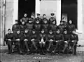 25th AS Officer Corps, Lt Luff pictured right of mascot