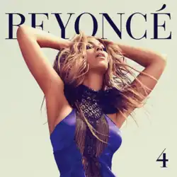 Beyoncé posing in a purple sleeveless dress and scarf