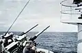 One of USS Rochester's 3-inch/50 caliber dual gun mounts in 1959.