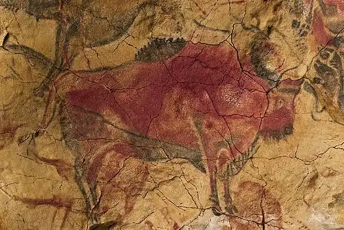 Bison in red ochre in the Cave of Altamira, Spain, from the Upper Paleolithic era (36,000 BC)