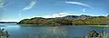 A panoramic partial view of Toba Lake, as seen from the west side to the southeast