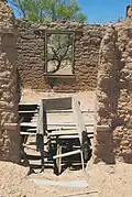 Adobe ruins, slowly melting away.