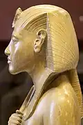 Profile of a statuette of Akhenaten wearing a nemes, c. 1351&nbsp;– c. 1332&nbsp;BCE
