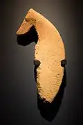 A stone sculpture of a dog that resembles the ancient native Saluki breed, dating back to 8100 BC.