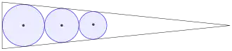 Three circles stacked with a greedy algorithm, maximizing their area in the same triangle.