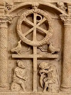 The Chi-Rho with a wreath symbolizing the victory of the Resurrection, above Roman soldiers, c. 350.
