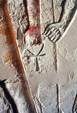 Detail of the ankh held from KV2