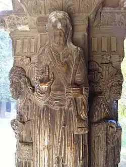 Cloister column with carving of St. Trophimus, (north gallery)