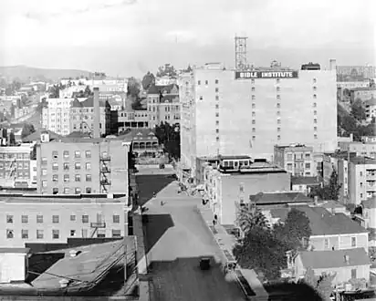 Looking north on Hope Street past Bible Institute of Los Angeles (now Biola University), 1912