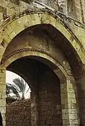 The entrance on the south-east façade with an inscription above