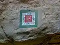 The Zoroaster's message "Good thoughts, Good words and Good deeds" on a stone over the spring
