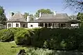 Louis Bolduc House Museum, in Ste. Geneviève, Missouri, c. 1792 is an example of poteaux-sur-sol construction.