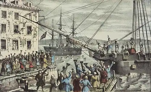Two ships in a harbor, one in the distance. On board, men stripped to the waist and wearing feathers in their hair are throwing crates into the water. A large crowd, mostly men, is standing on the dock, waving hats and cheering. A few people wave their hats from windows in a nearby building.