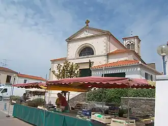 The church and the square, with the market