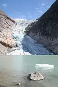 The glacier as seen from the lake in July 2006
