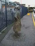 Woman waiting at Brixton