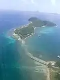 Aerial view of Buck Island, with, from left to right, Ginger Island, Cooper Island and Salt Island on the horizon