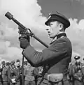 A Sturmpistole firing a HE grenade probably based on the Stielhandgranate 43[broken anchor]