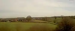 view of Burton-le-coggles from the train