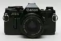 Black model with 50&nbsp;mm f/1.8