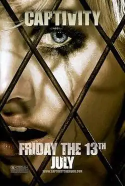 A close-up of Jennifer Tree's terrified face behind bars.