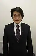 Image 14Example of the two button slim-fit suit popular in the late 2000s in the UK, US and China. (from 2000s in fashion)