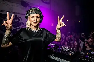 Novelli performing for an Odin Works event at Nextdoor in Honolulu, Hawaii, 2014