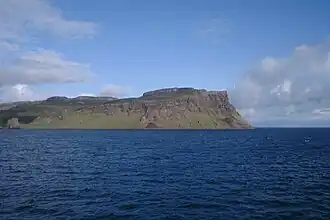Extreme east of Canna Island with Compass Hill. In the left the stack Dùn Mòr.