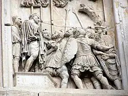 Detail of relief panel, south side, right panel of left arch