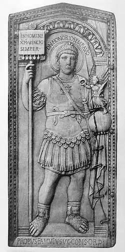 406 representation of Honorius attended by a winged Victory on a globe and bearing a labarum with the words In nomine XRI vincas semper, lit. 'In the name of Christ thou wilt always conquer'