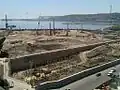 Construction site (30.04.2013): Start of piling on the island; onshore section ready for construction of podium