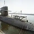 Zwaardvis being re-armed with torpedoes