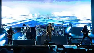 Dream Theater in 2025. From left to right: John Myung, Jordan Rudess, James LaBrie, Mike Portnoy, and John Petrucci.