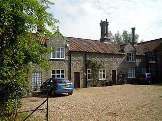 The service buildings on the east range of the hall.