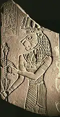 Votive plaque of king Tanyidamani and Apedemak, The Naqa kiosk, Excavation by John Garstang, 1909-1910, in the Temple of Apedemak; c. 100 BC; siltstone; 18.5 × 9.5 cm Walters Art Museum