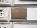 Plaque outside the embassy in Dari and English